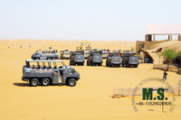 //ikrorwxhonppln5m-static.micyjz.com/cloud/lkBpiKoklrSRiljnpjljjo/desert-cruiser-bus-in-tourism-area.jpg