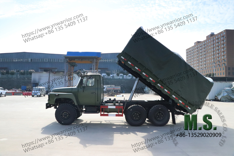 Side perspective of Chinese dump truck lifted up the cargo box
