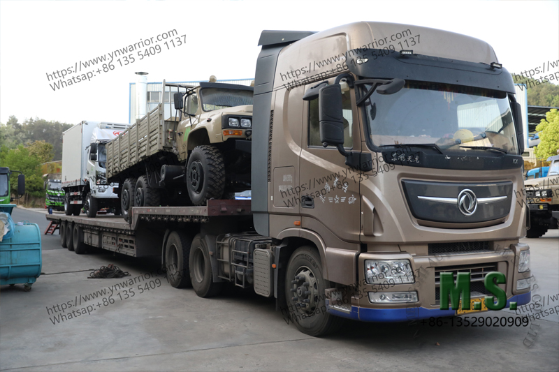 FAW tractory truck carrying Dongfeng truck