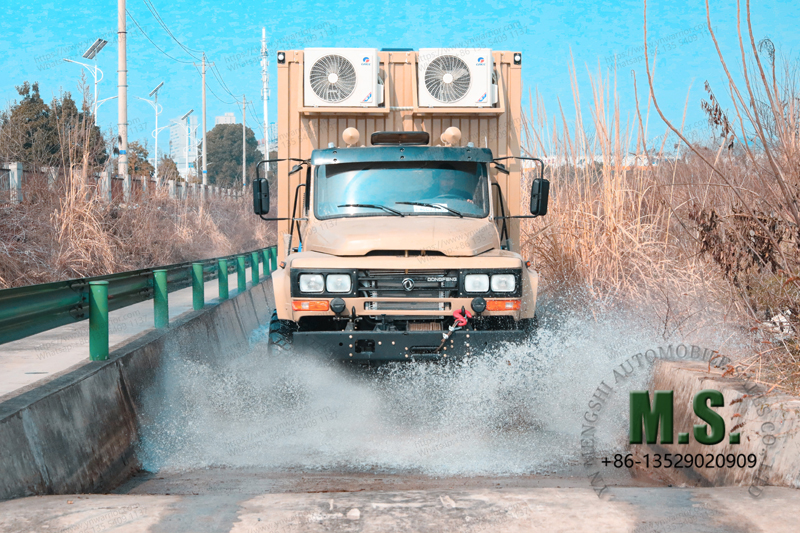 Dongfeng van type truck crossing water