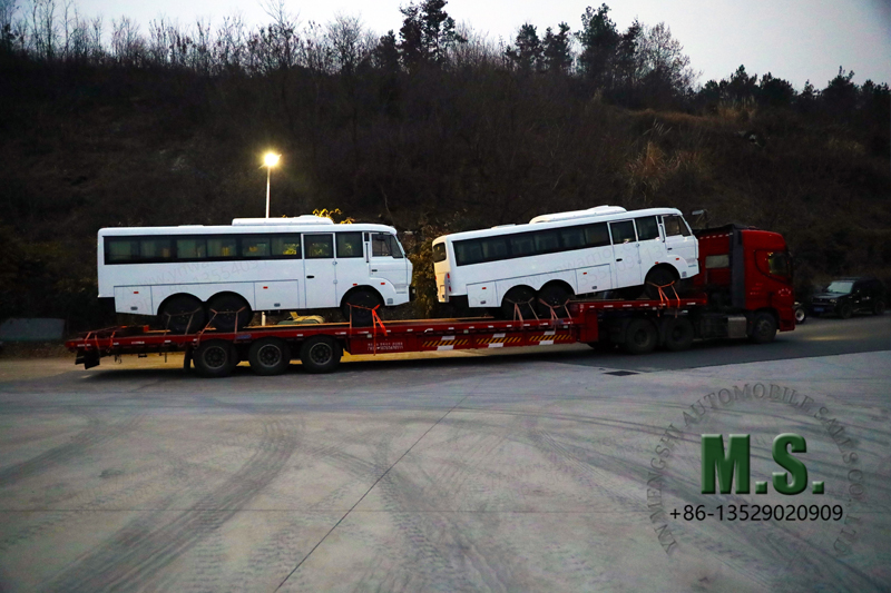 white 6X6 bus dispatched