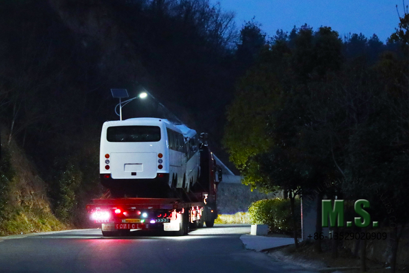 6X6 bus shipping in the night