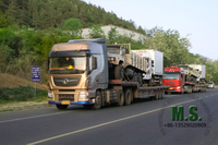 //ikrorwxhonppln5m-static.micyjz.com/cloud/lrBpiKoklrSRjlikpmojjq/Chinese-tractor-truck-carrying-the-truck-to-ship-out.jpg